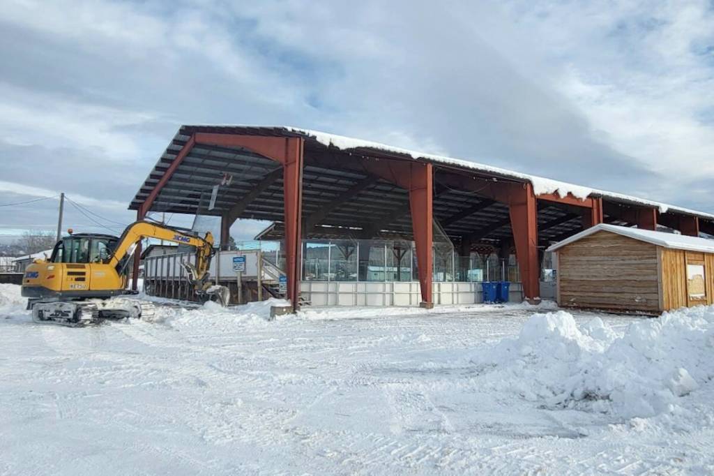 Clearing snow to prepare for the games, the ice is already set but still needs to be finalized. (Taylor Hansen)